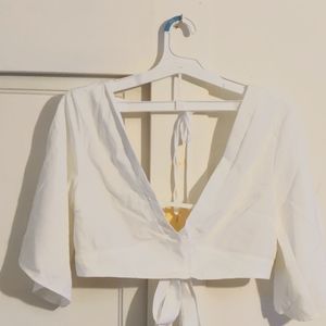 White V neck and v back tie top with mid length sleeves